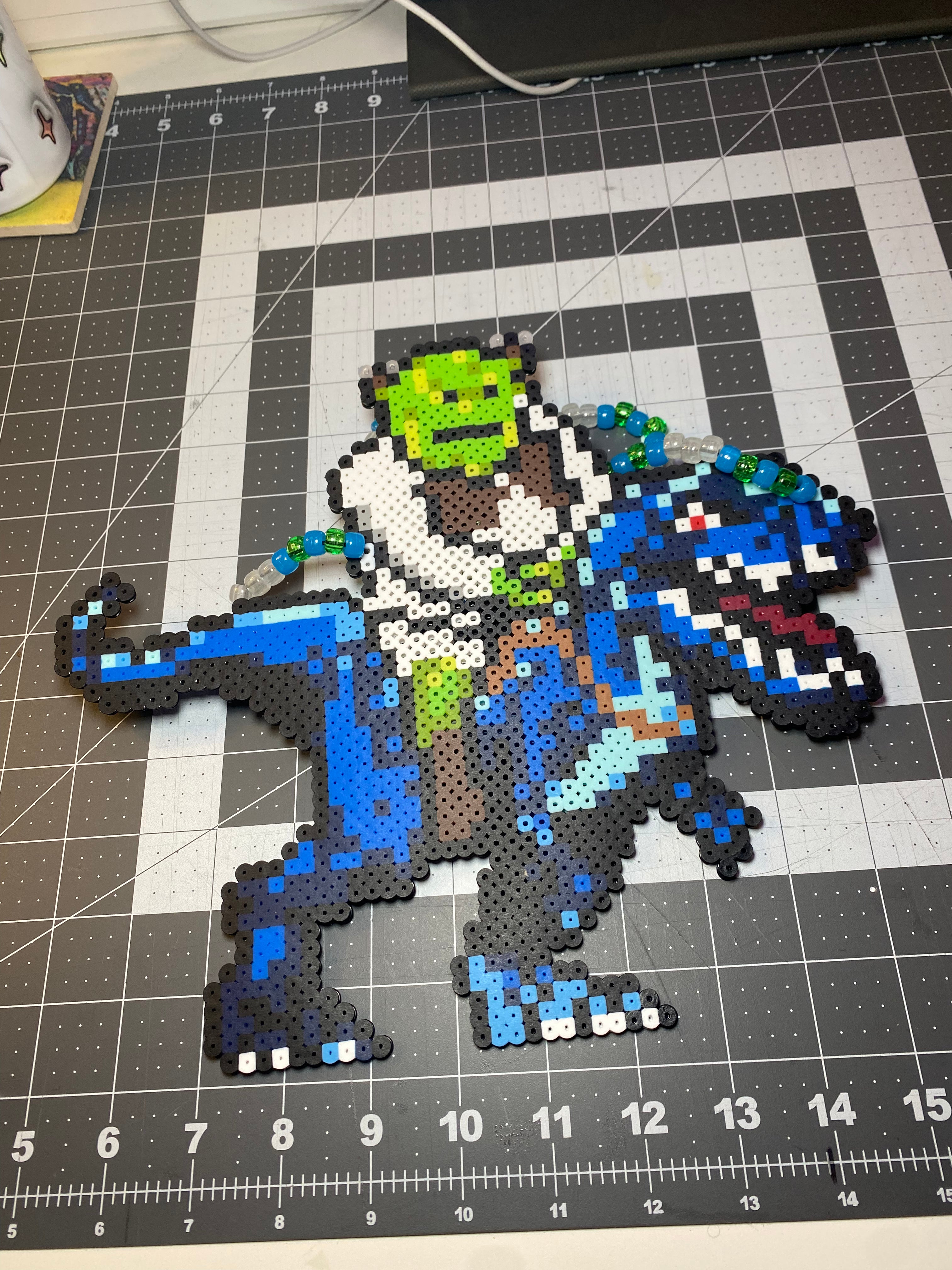 Shrek riding T-Rex Rave Perler